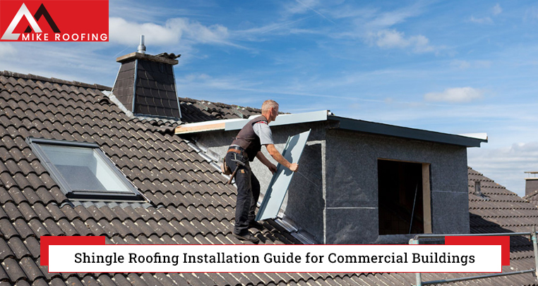 Workers installing Shingle roofing on commercial building